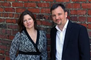 Helen Reed and Mike Wade, co-founders of SEElogix. Built-in, customizable reminders alert users to routine tasks such as changing smoke detector batteries or scheduling fall lawn aeration services.